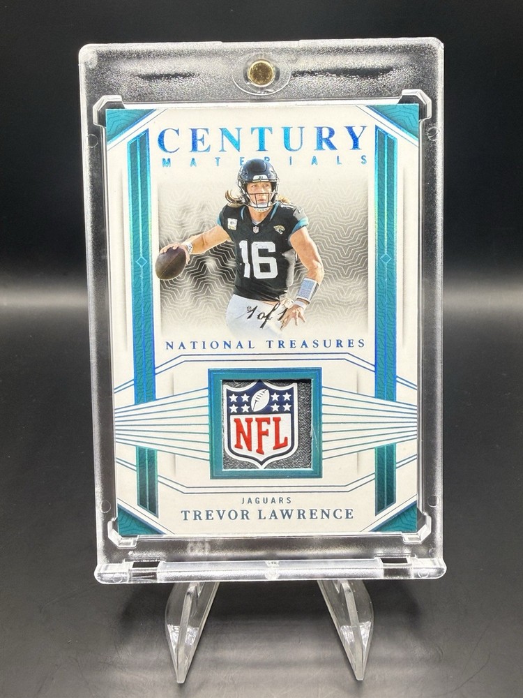 2023 National Treasures- Century Materials Trevor Lawrence NFL Shield /1 Jaguars