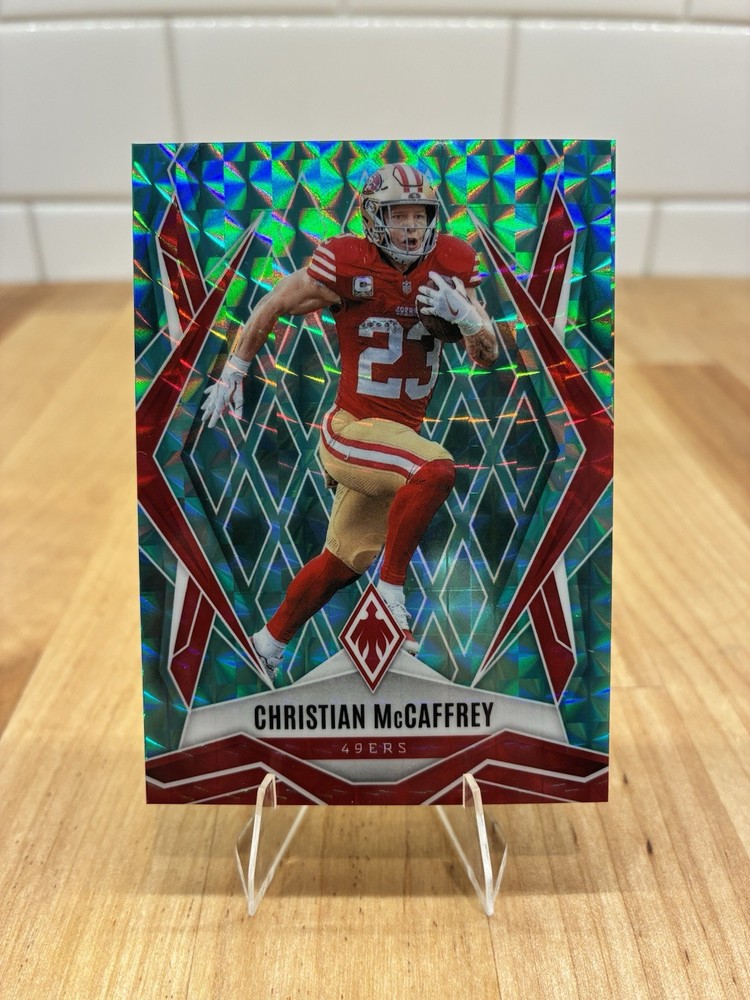 2025 Panini Phoenix – Christian McCaffrey #34 Aqua /225
